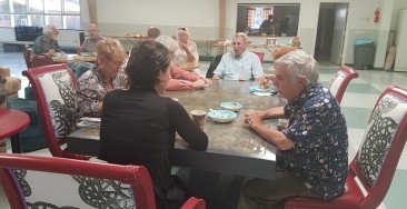 people eating together at a table